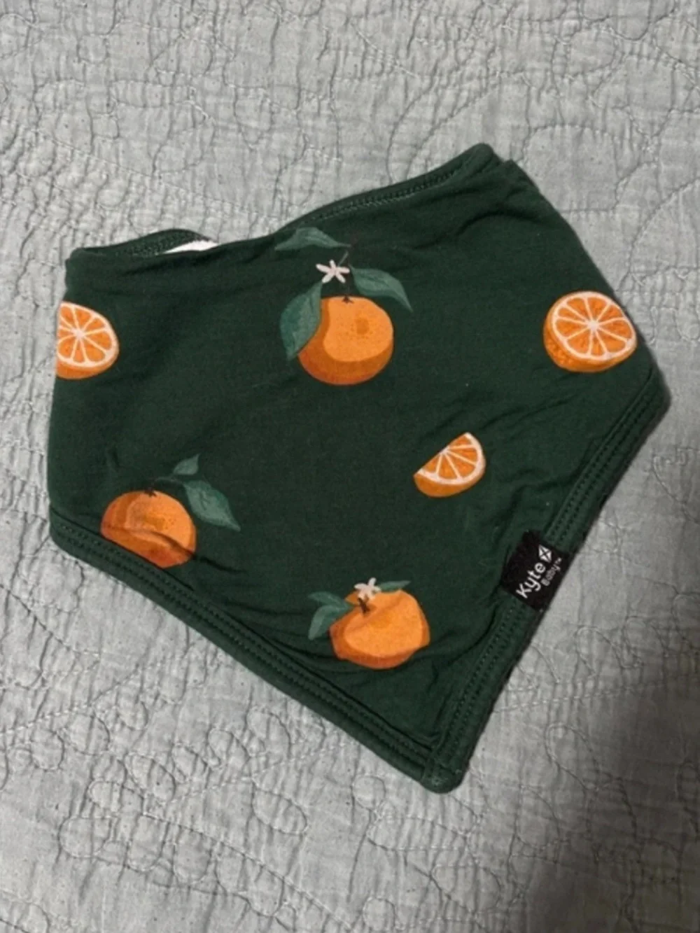 Kyte Baby Bib in the Oranges print
